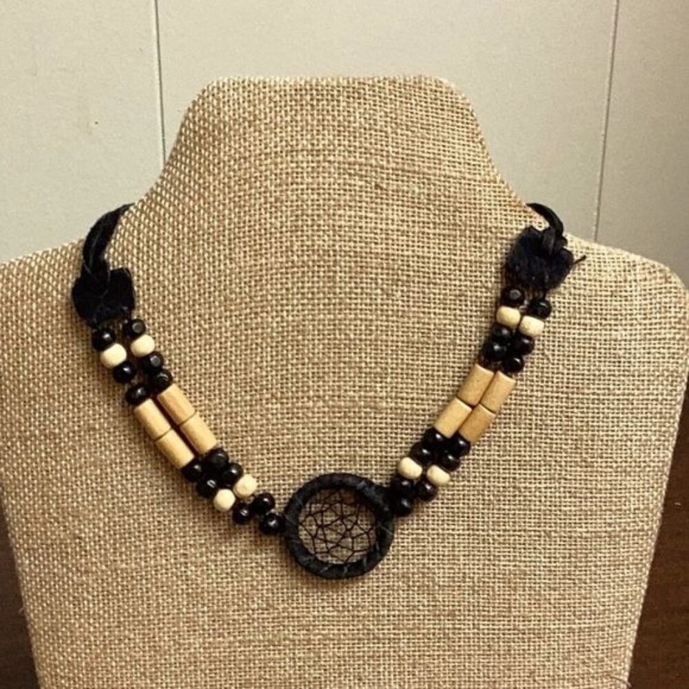 Black leather dreamcatcher choker with wooden beads. Leather straps tie SKU 056